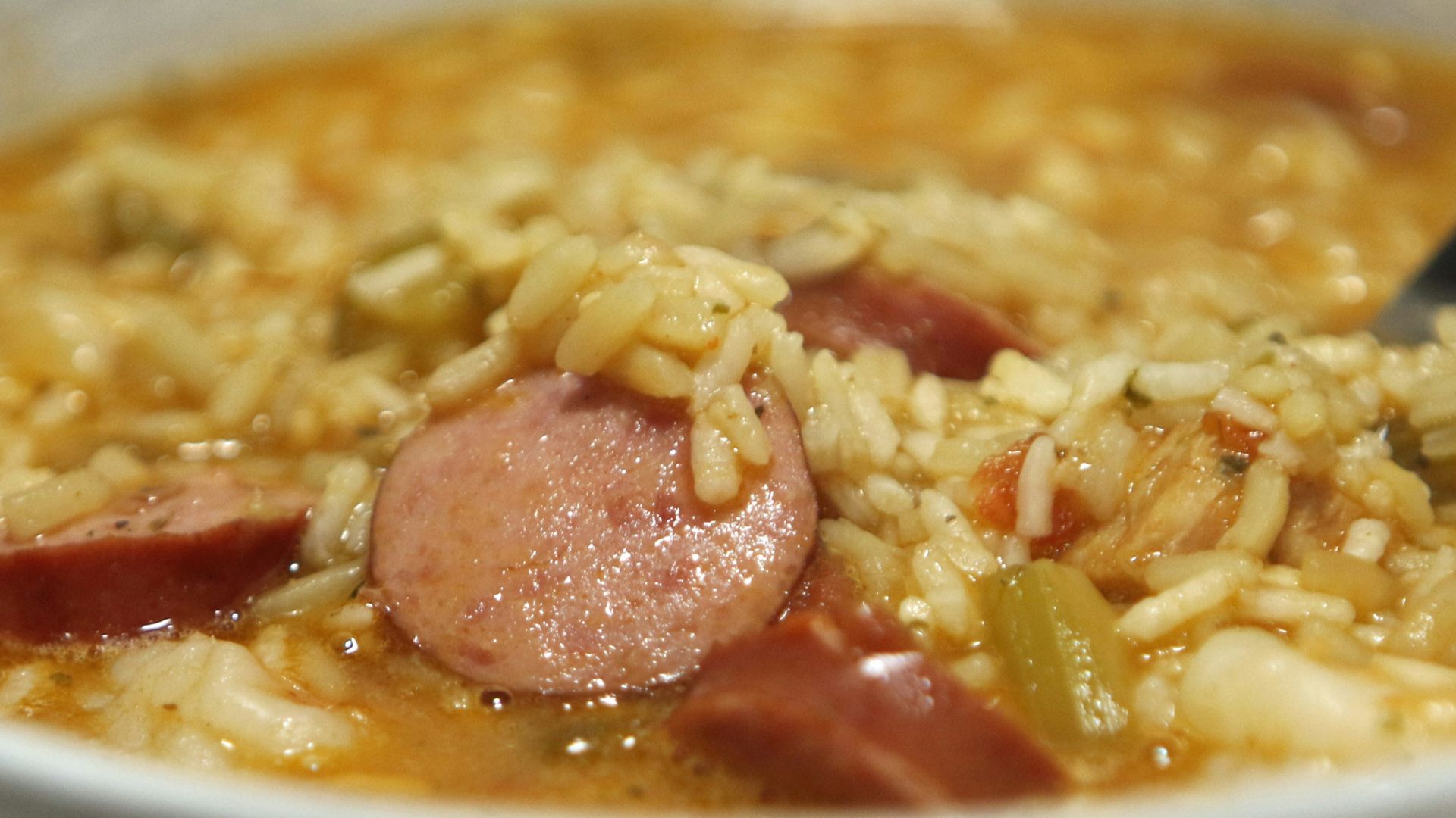 a bowl of soup with a spoon in it