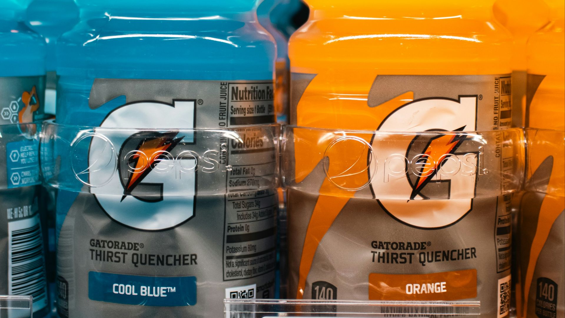 Gatorade bottles are displayed on a store shelf.
