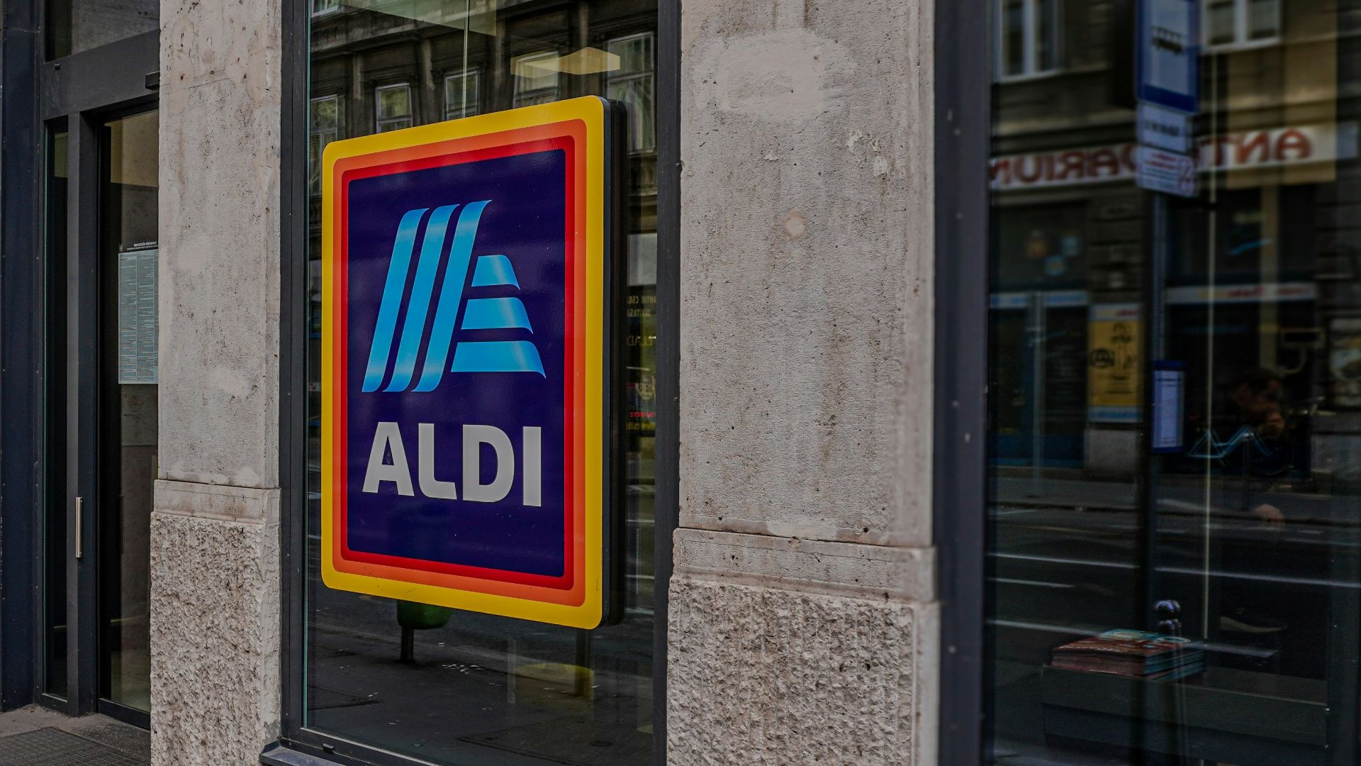 a store front with a large ad on it