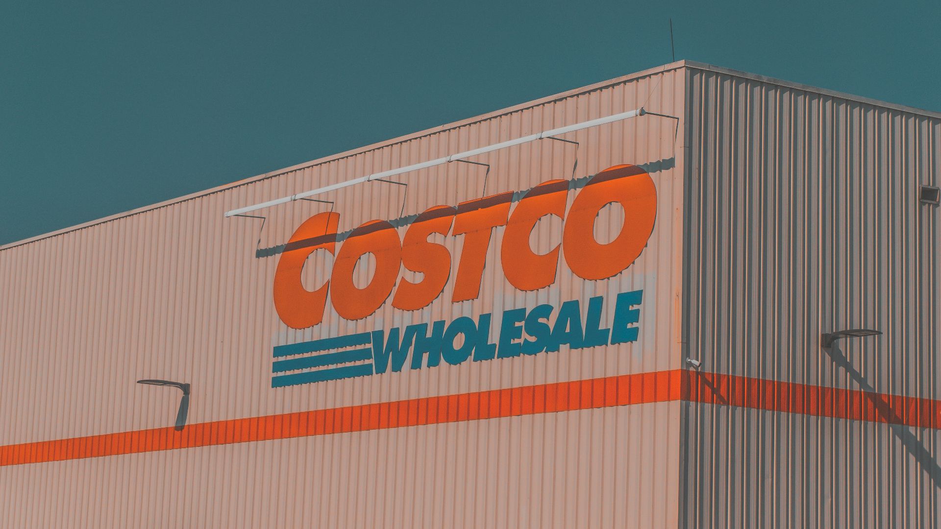 a building with a sign that says costco whole sale