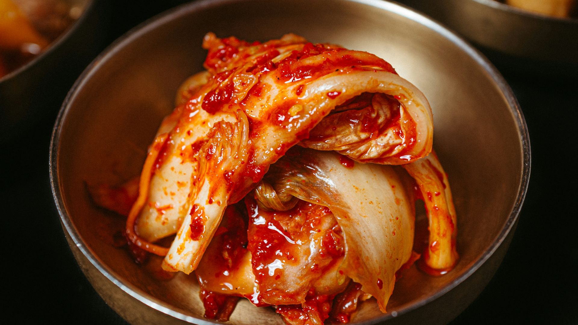 a table topped with bowls filled with food