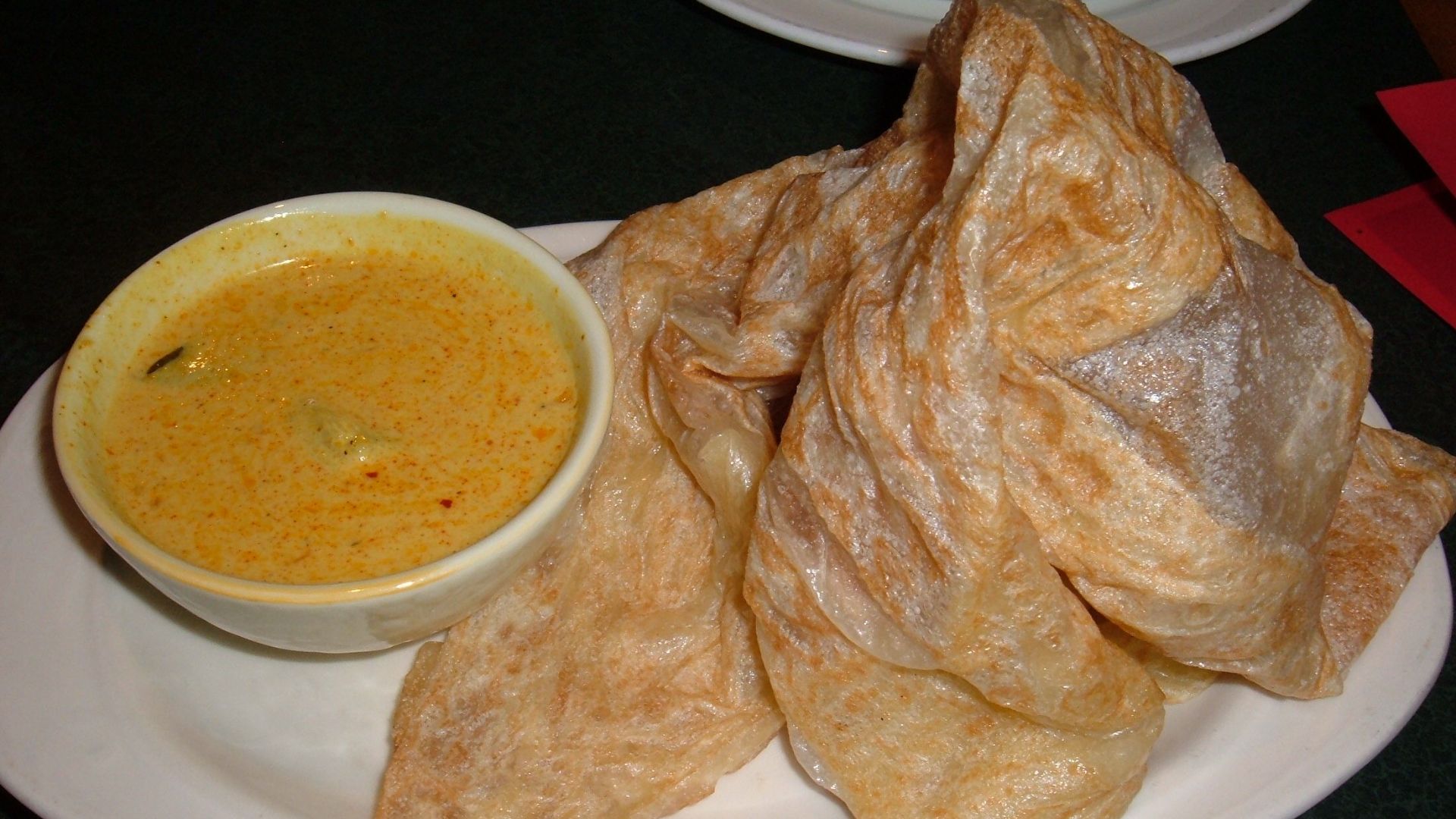 File:Roti canai with sauce.JPG