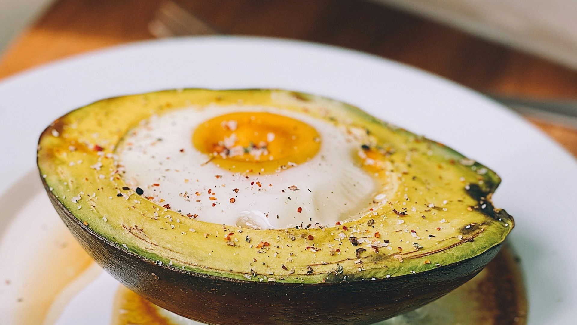 sliced avocado on white ceramic plate