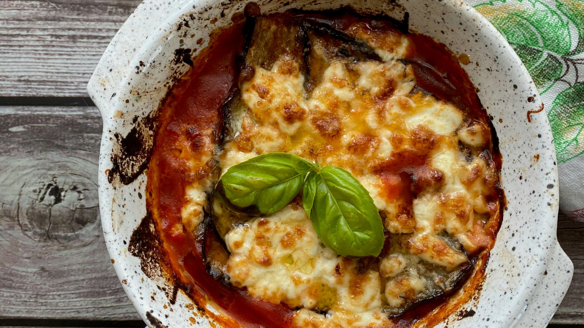 a dish of food on a wooden table