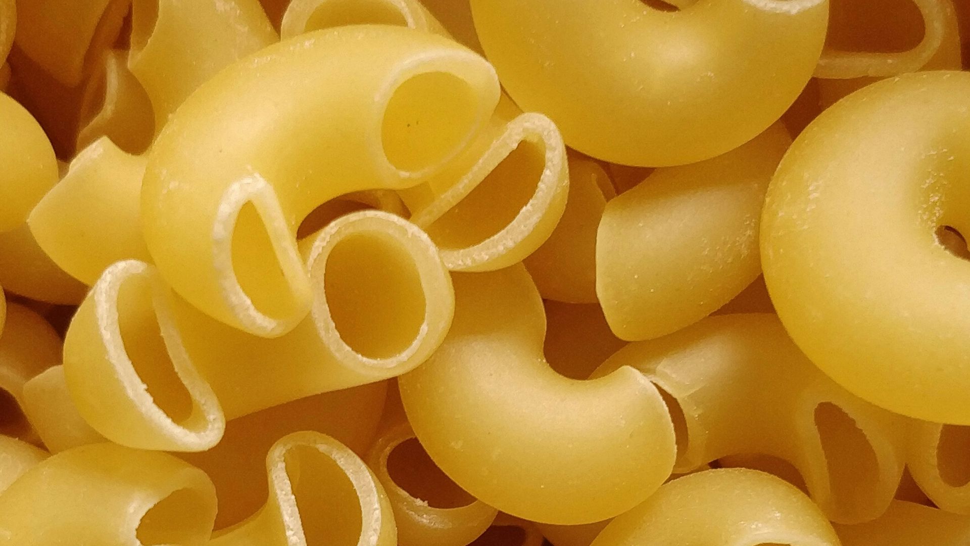 yellow rubber balloons in close up photography