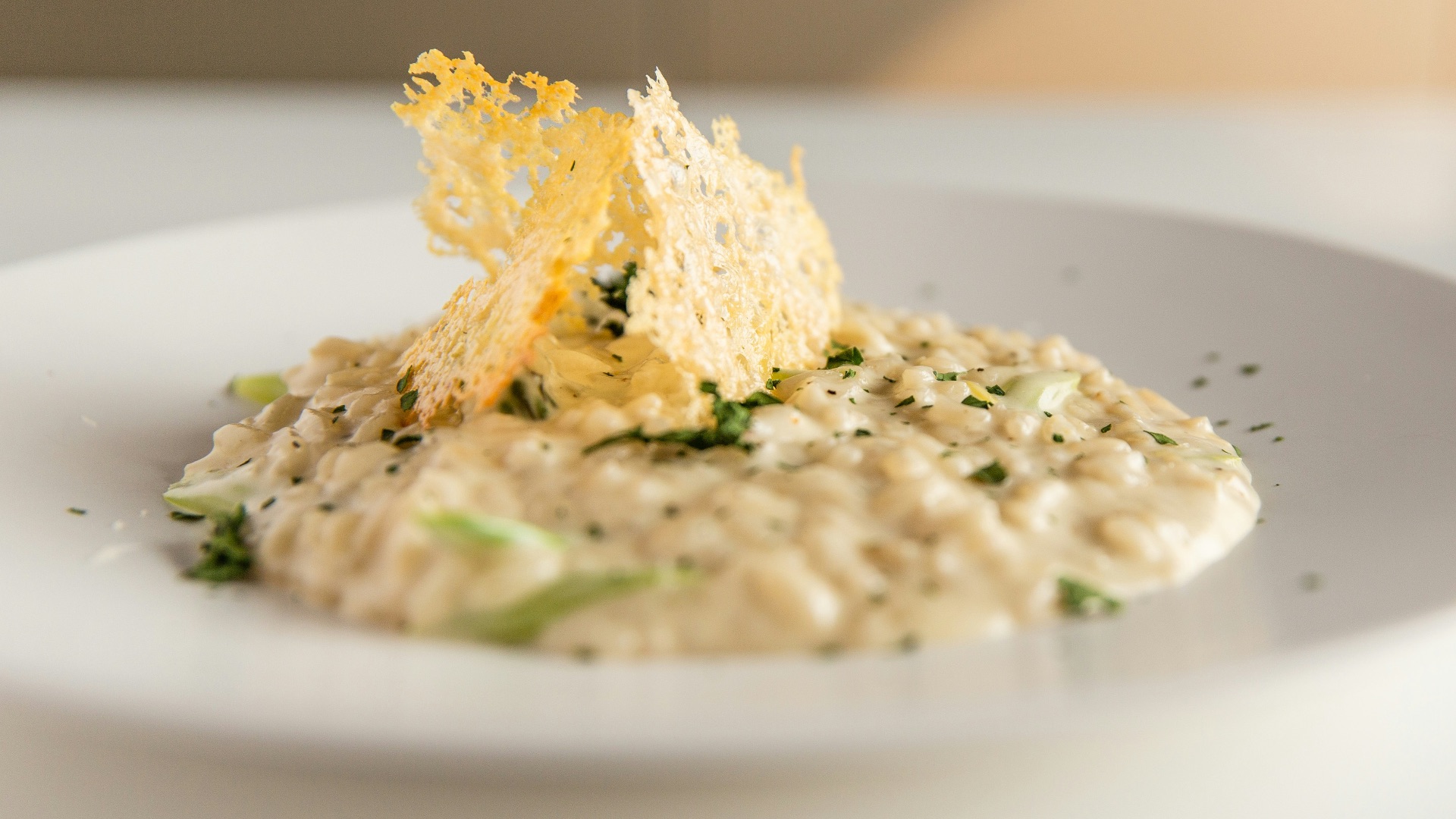 a white plate topped with food on top of a table