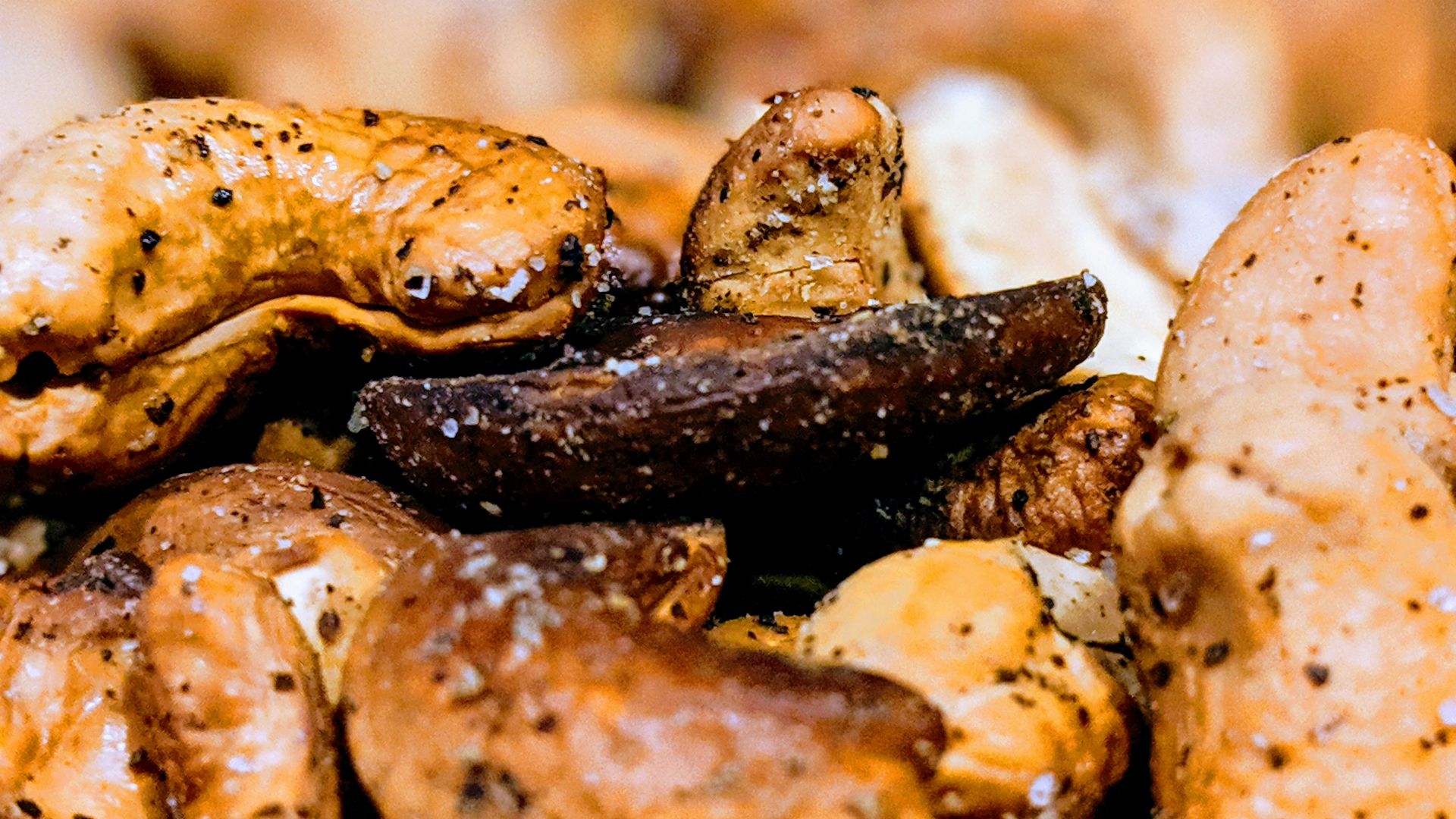 a close up of a pile of chicken wings