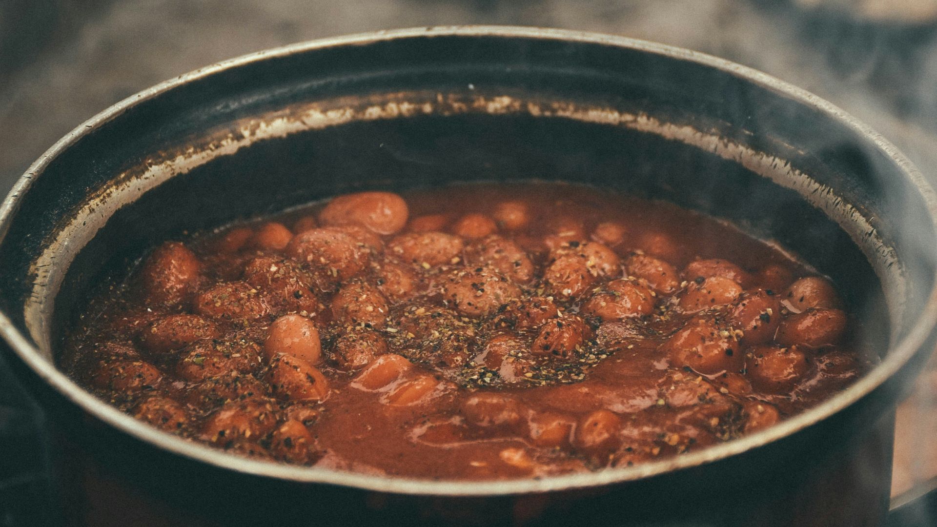 cooked food in black cooking pot