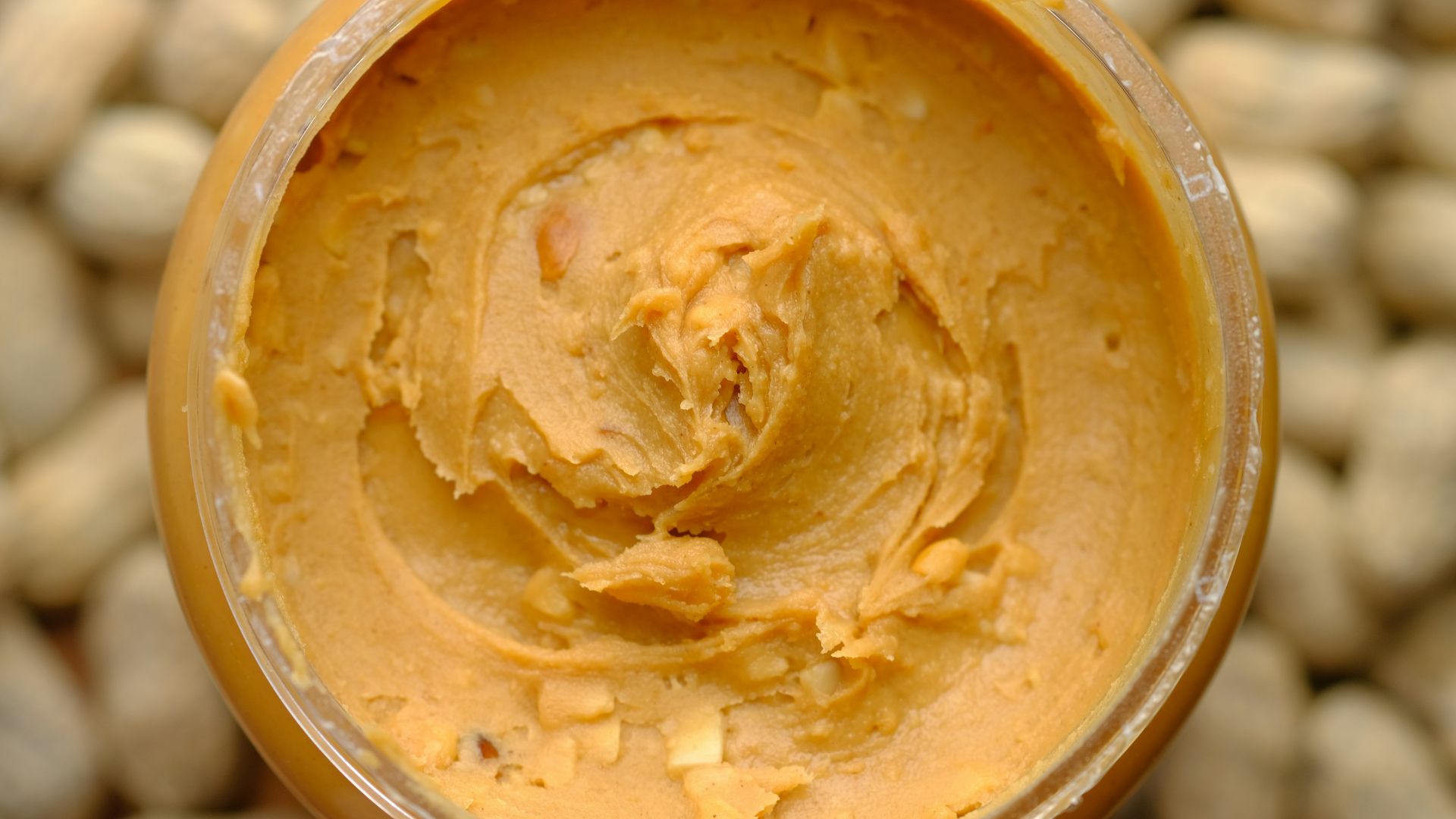 brown powder in brown round container