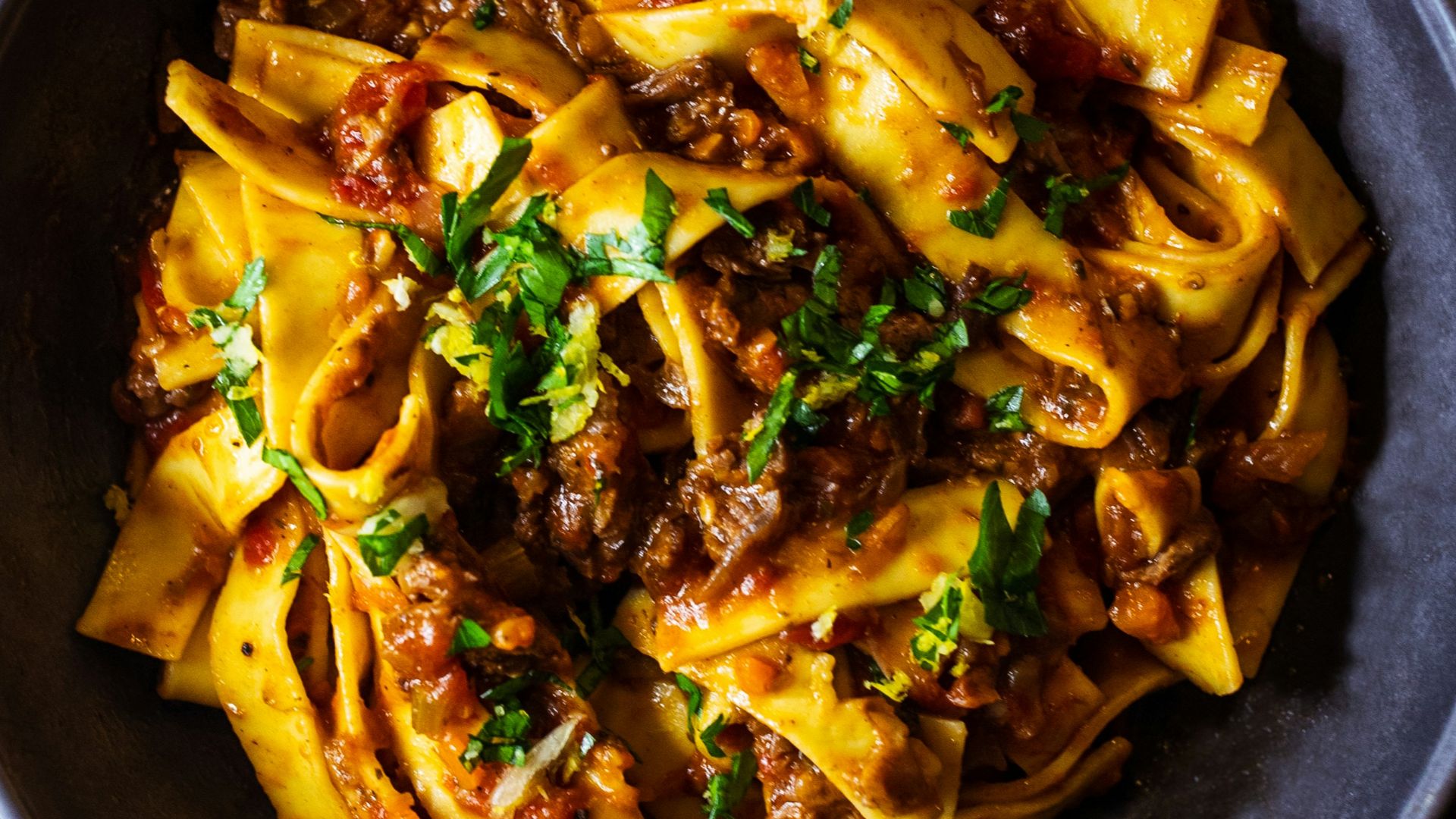 pasta dish on black ceramic bowl