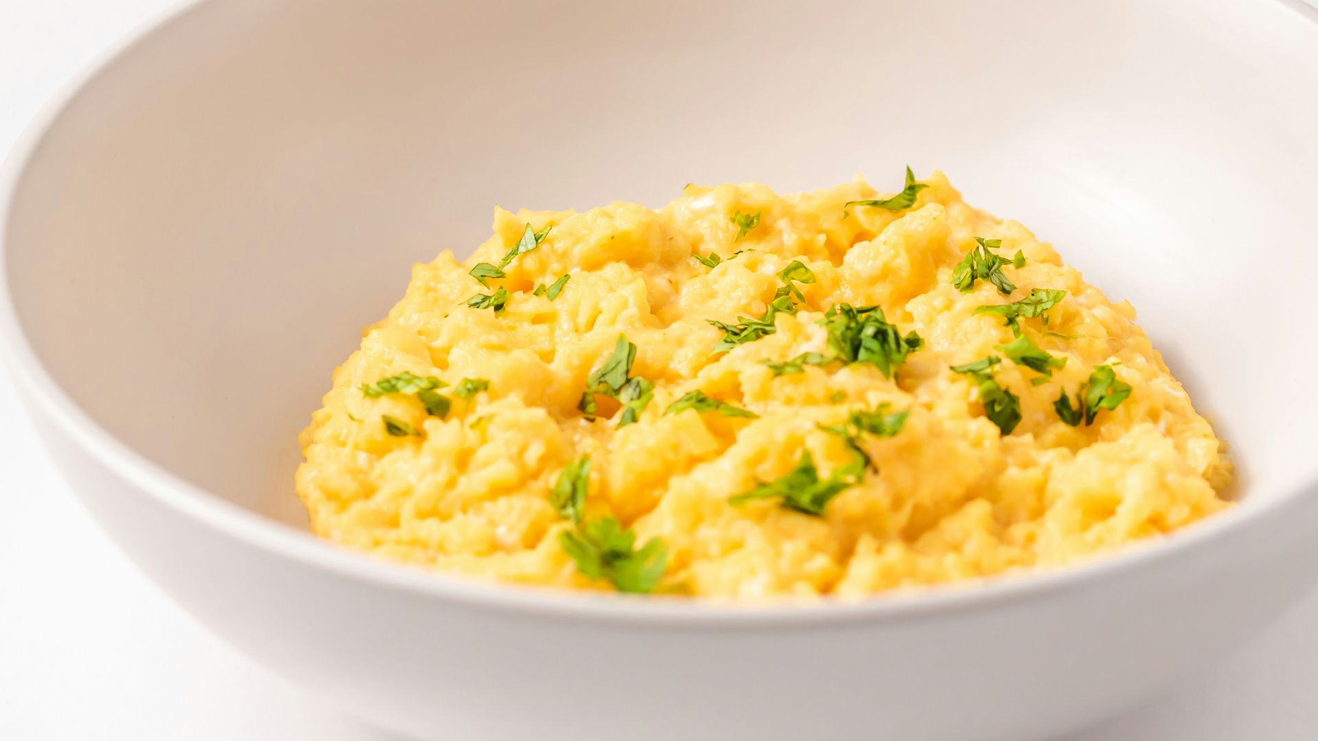 a close up of a bowl of food on a table