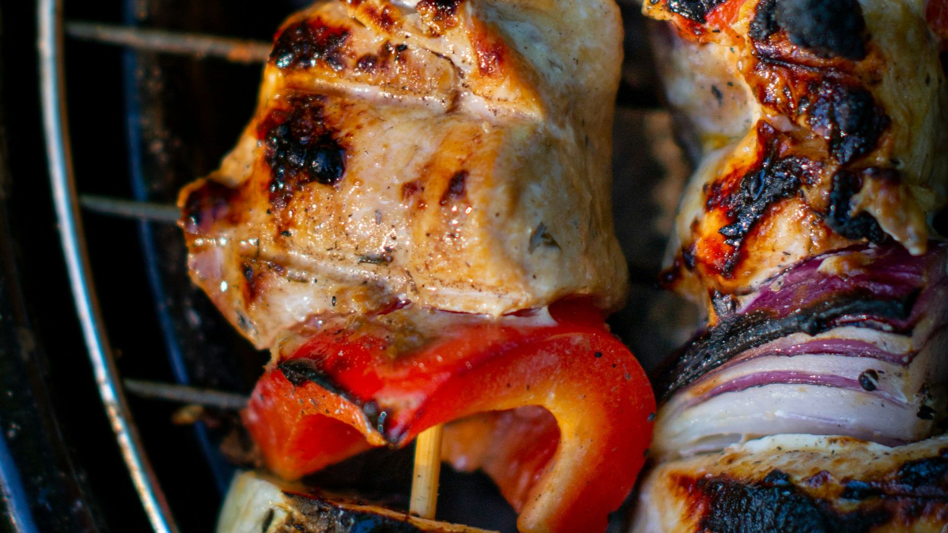 grilled meat on black metal grill