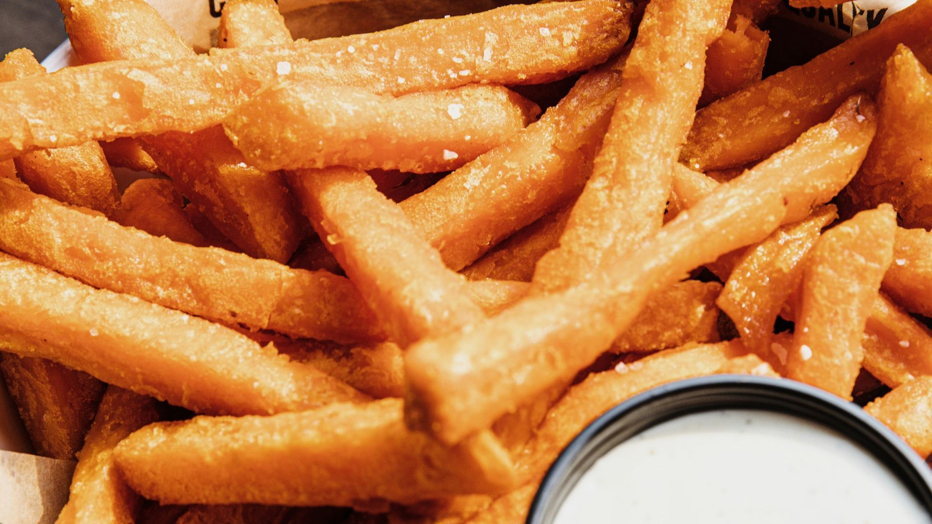 fried fries on white paper