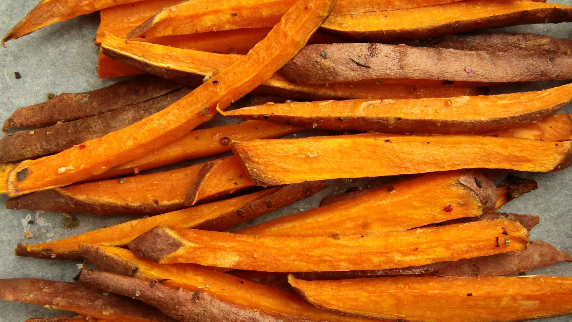sliced carrots on gray surface