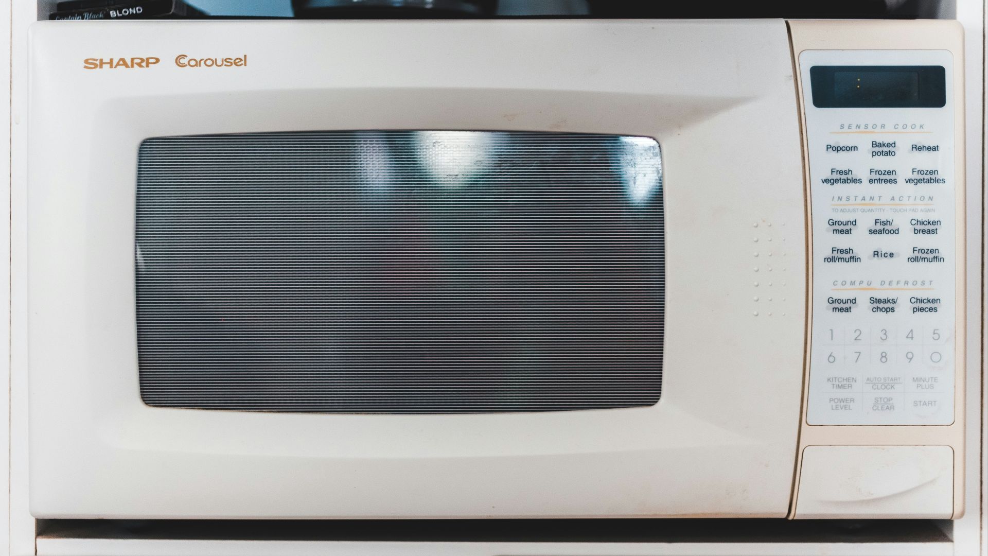 white microwave oven turned off