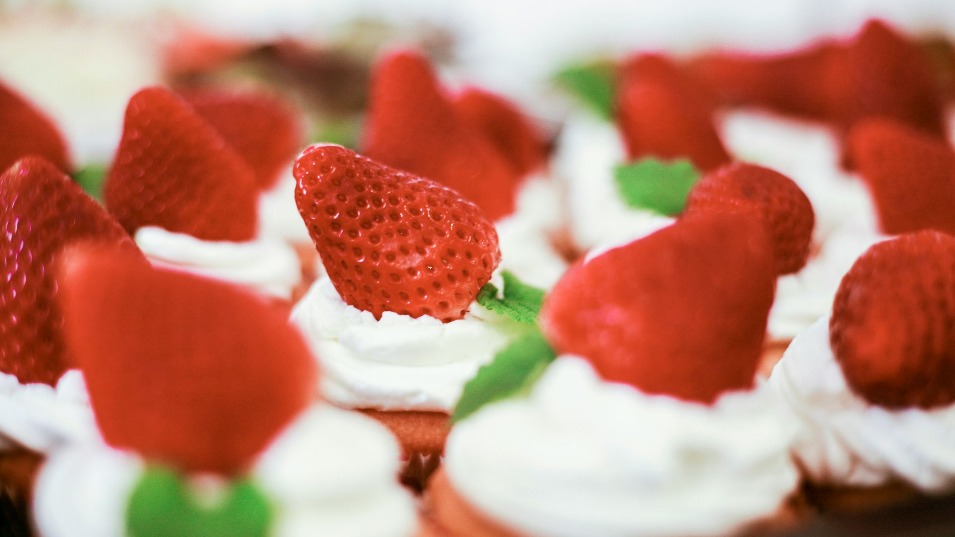cupcakes with strawberries on top