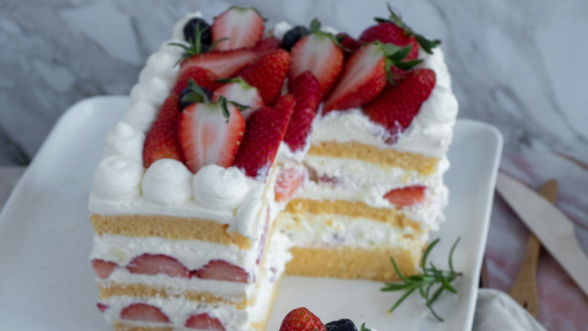 white and red strawberry cake