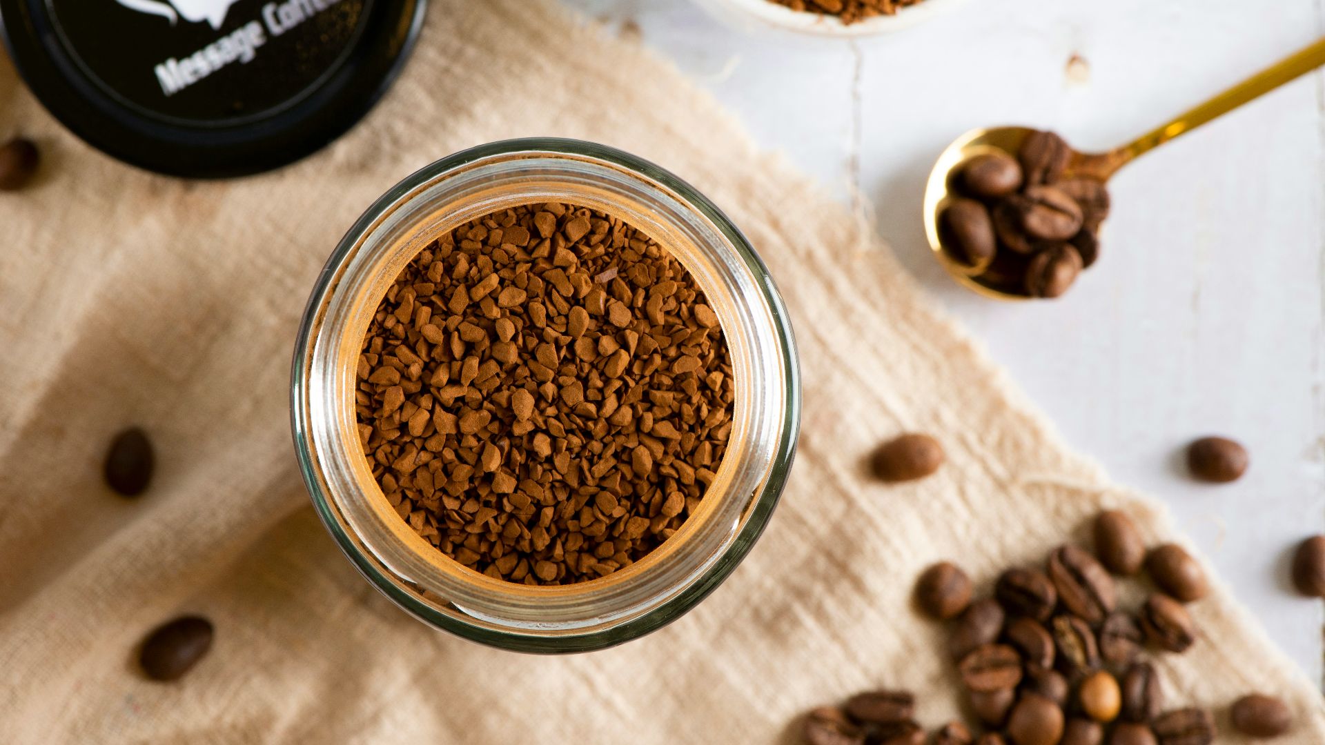 a bowl of cereal with milk and a spoon
