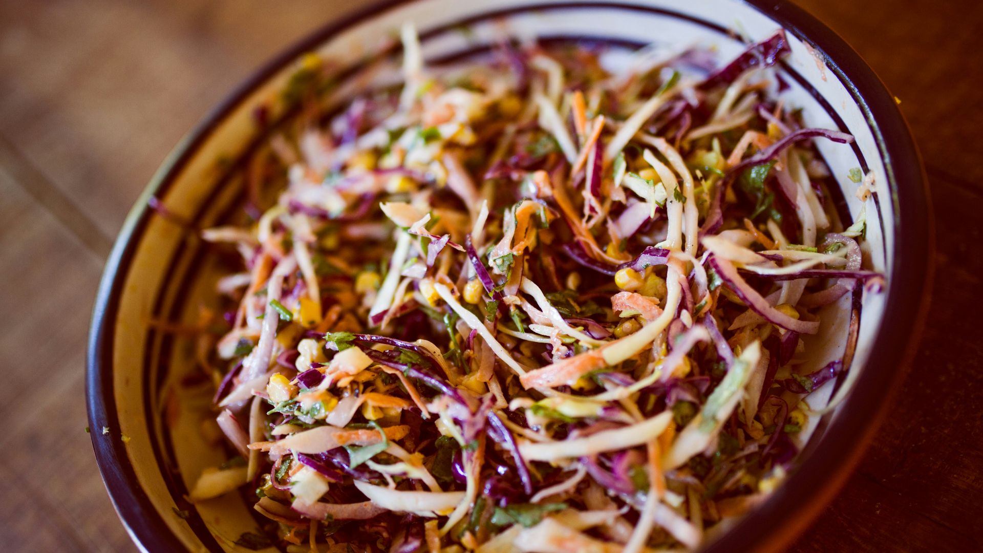 vegetable salad on white and black ceramic bowl
