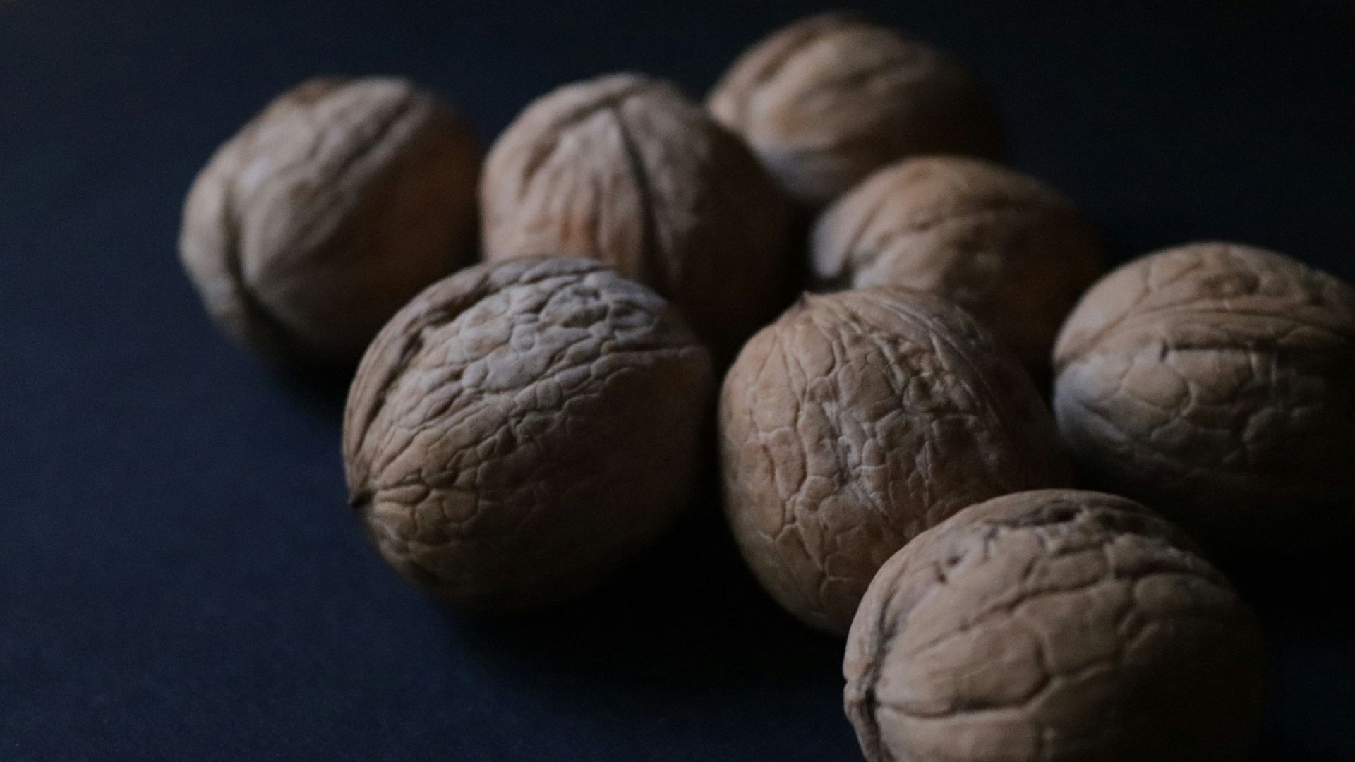 a pile of nuts sitting on top of a table
