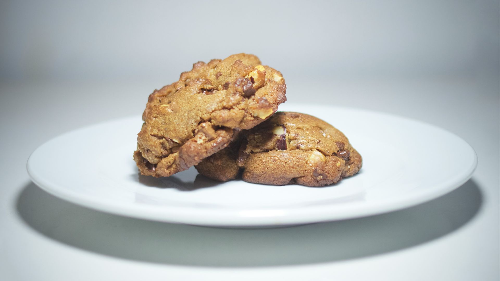 brown cookies on white ceramic plate