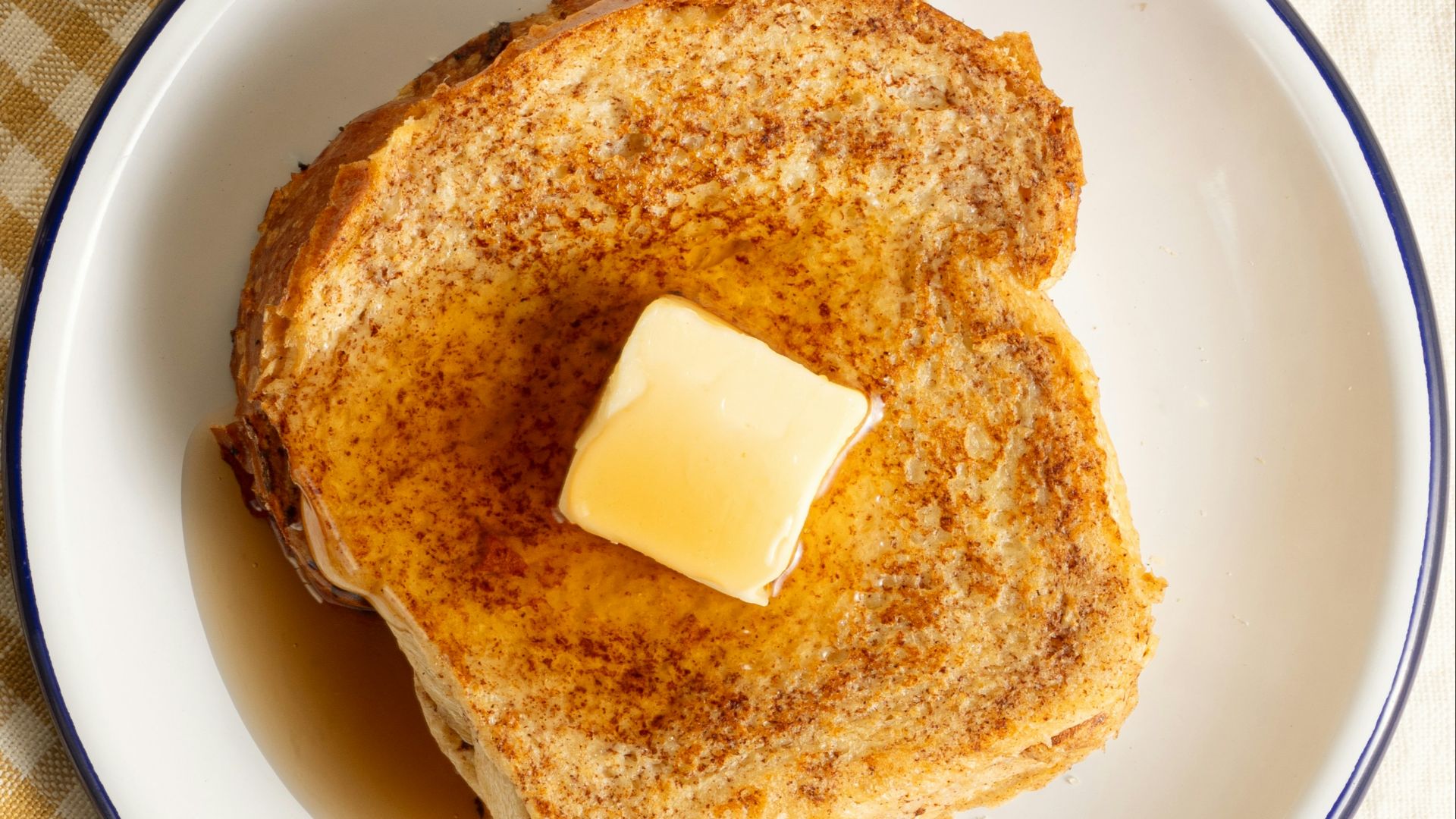 French toast with butter and syrup awaits.