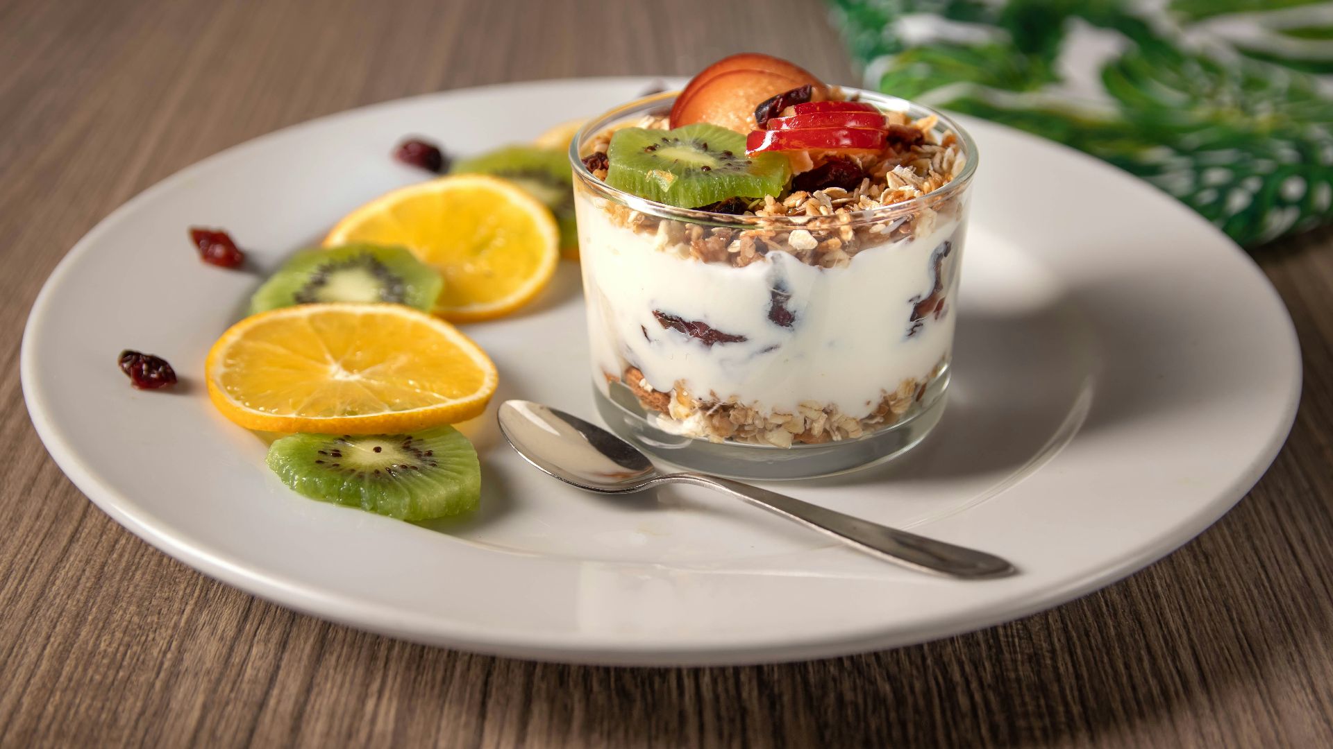 ice cream with sliced lemon on white ceramic plate