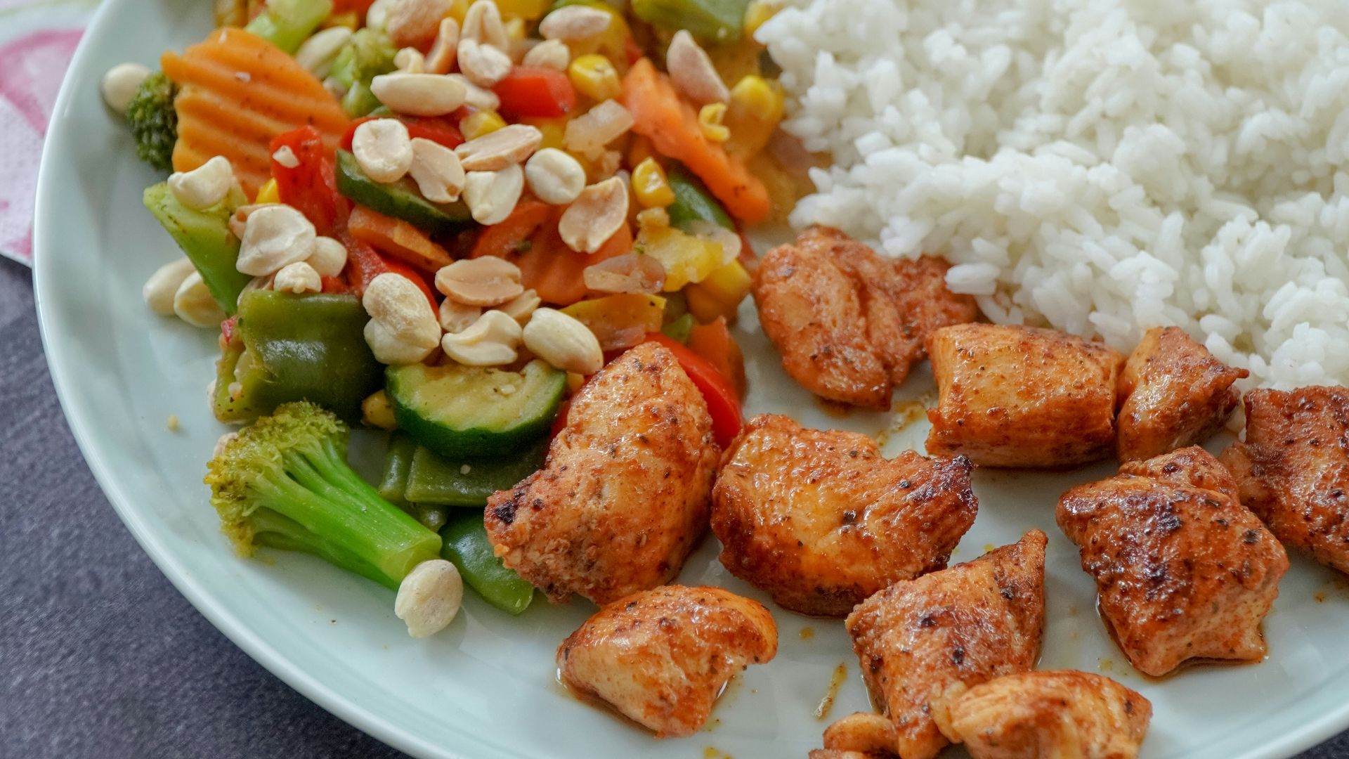 rice with sliced vegetables on green ceramic plate