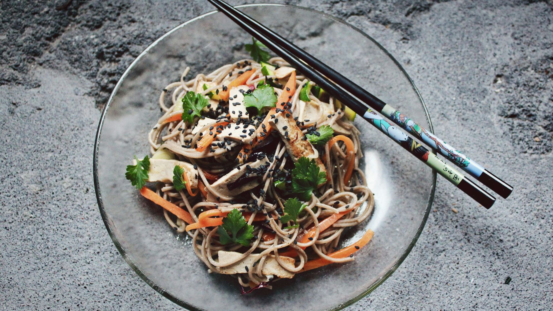 vegetable noodle with chopstick on glass plate