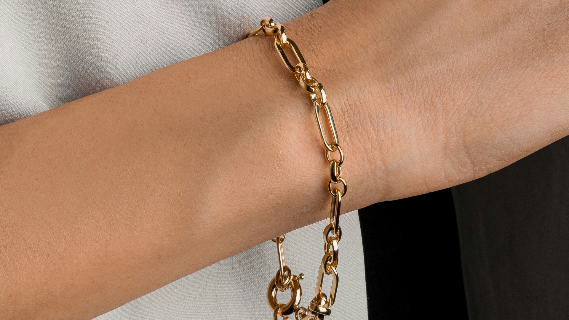 a close up of a person wearing a bracelet