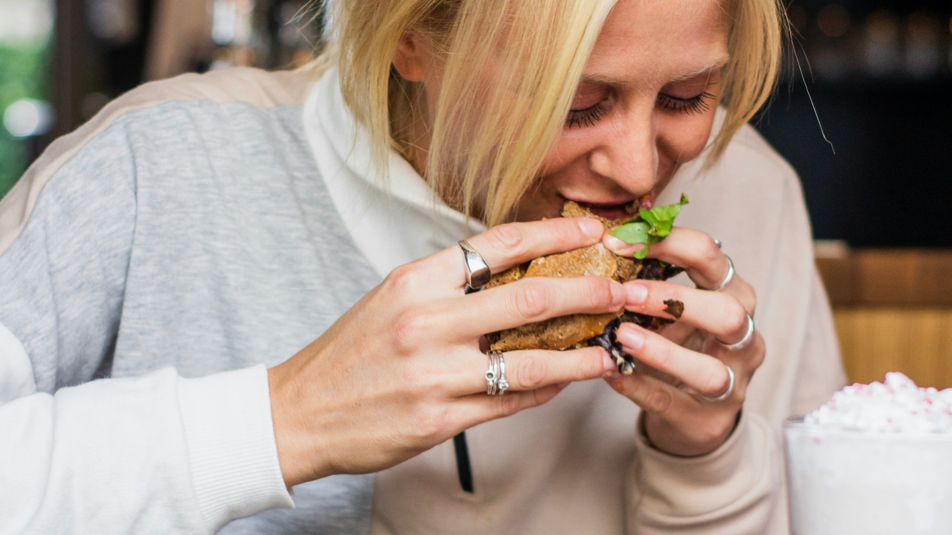 woman eating burger