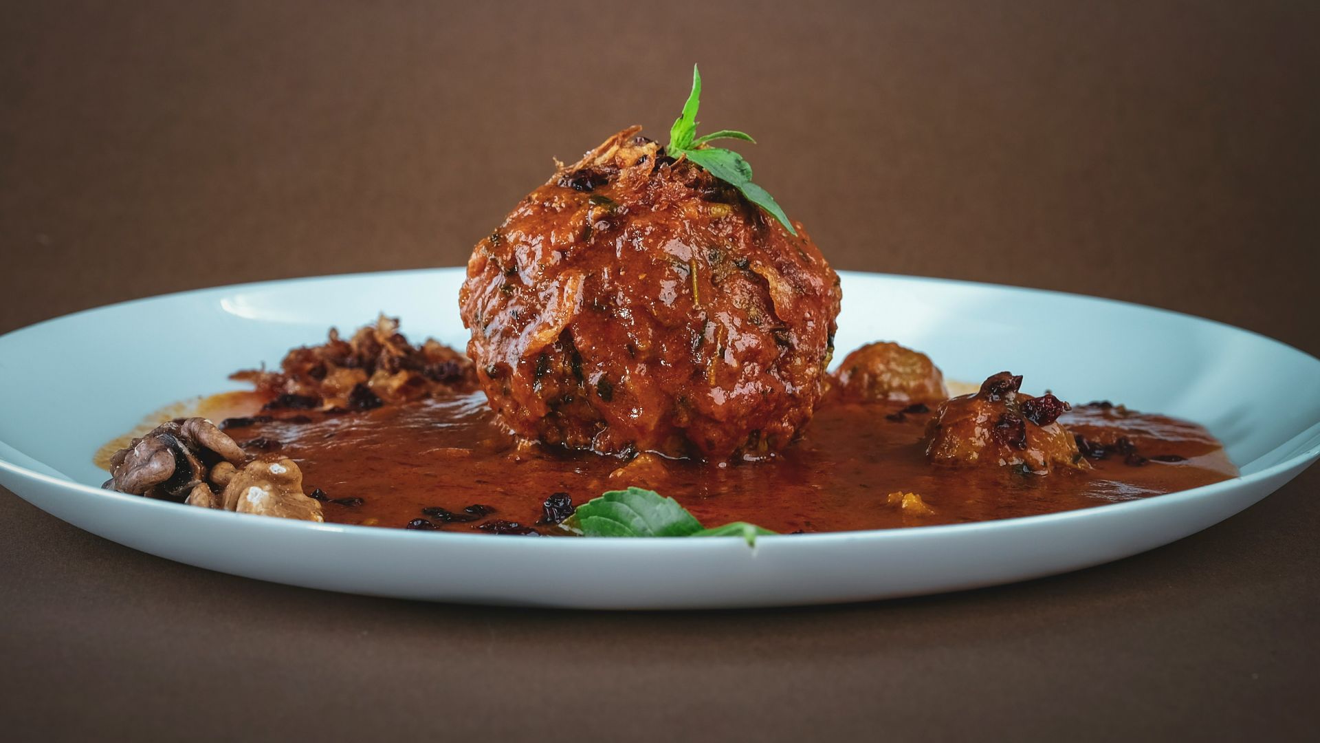 cooked meat on white ceramic plate