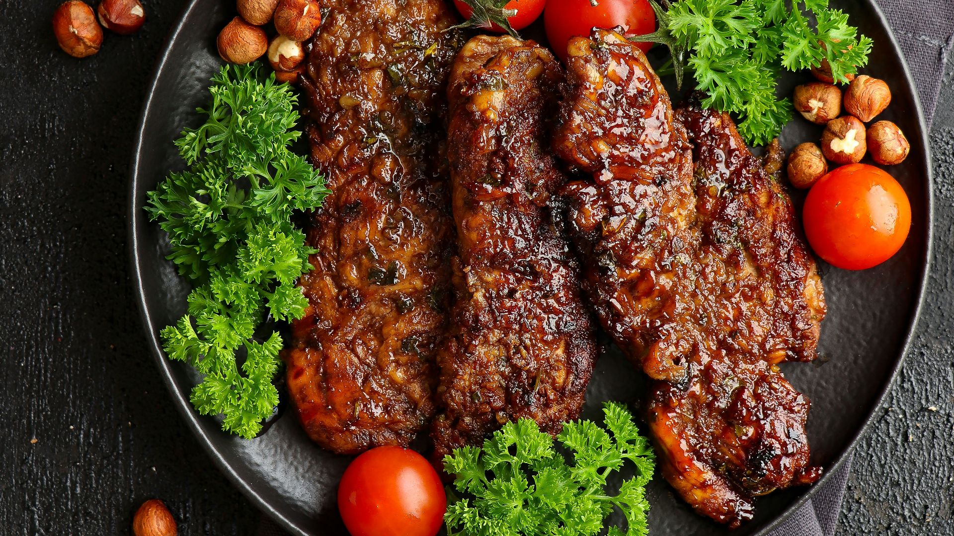 a plate of meat and vegetables on a table