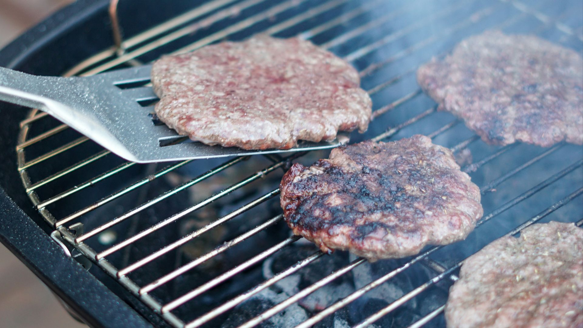 brown meat on black grill