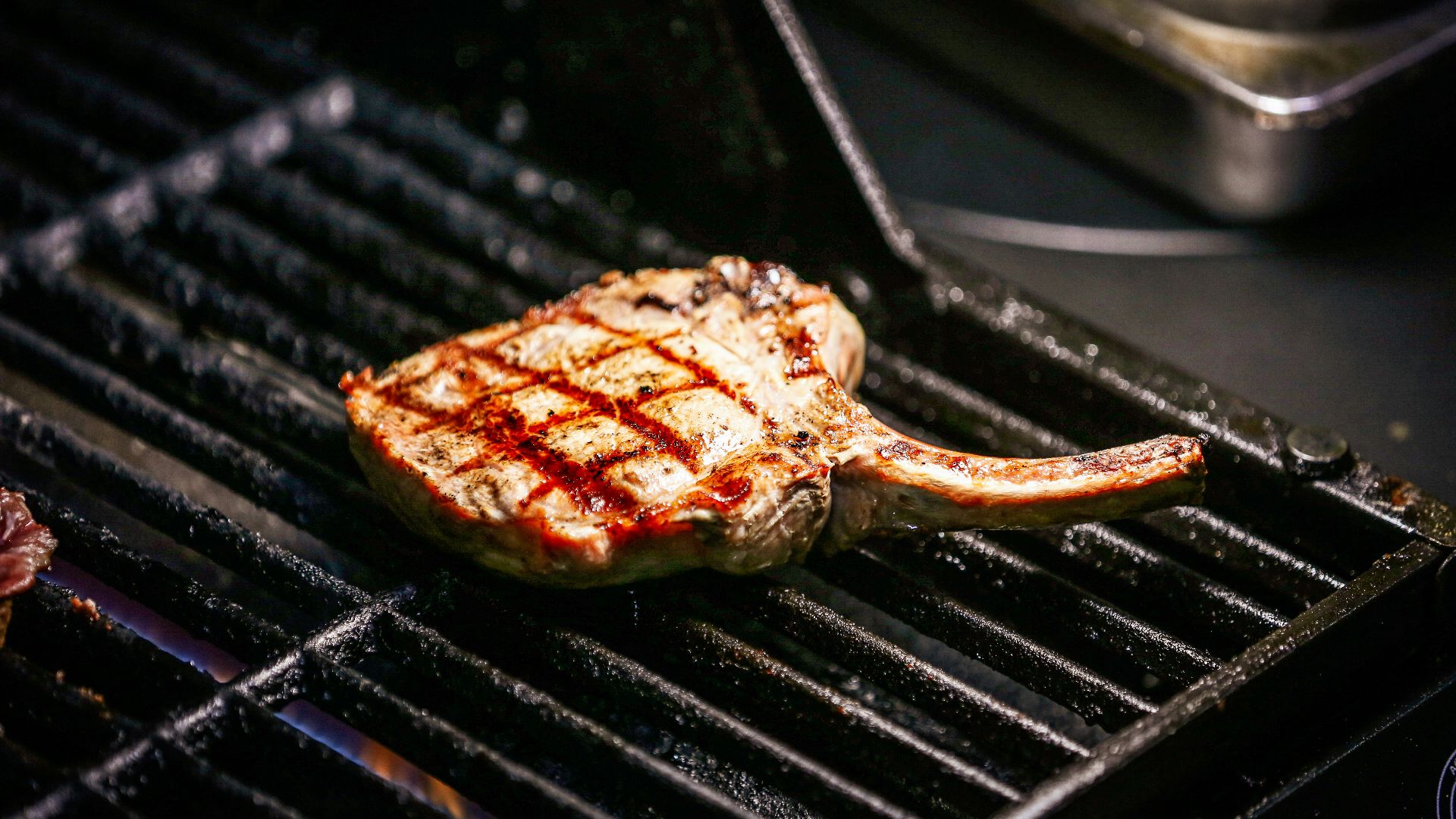 a cooked piece of meat on a grill