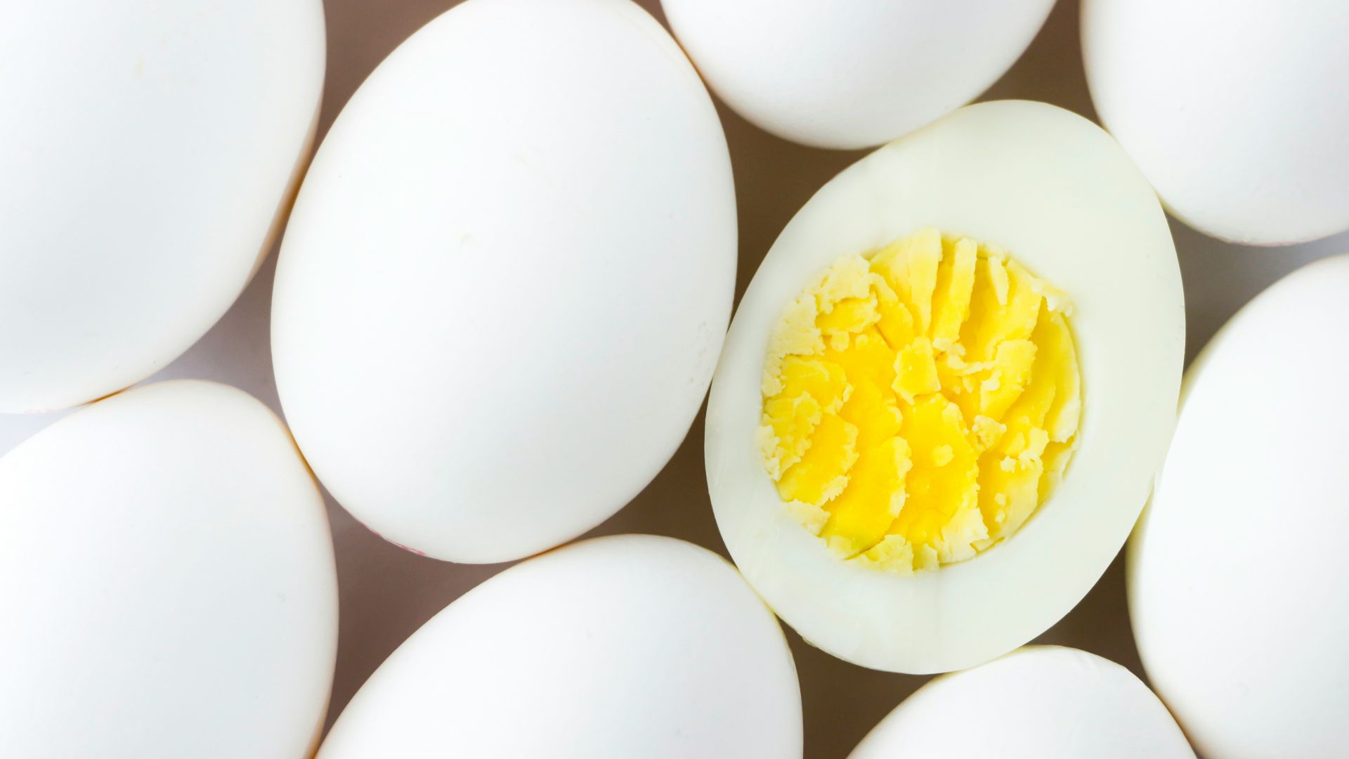 white egg lot on brown wooden table