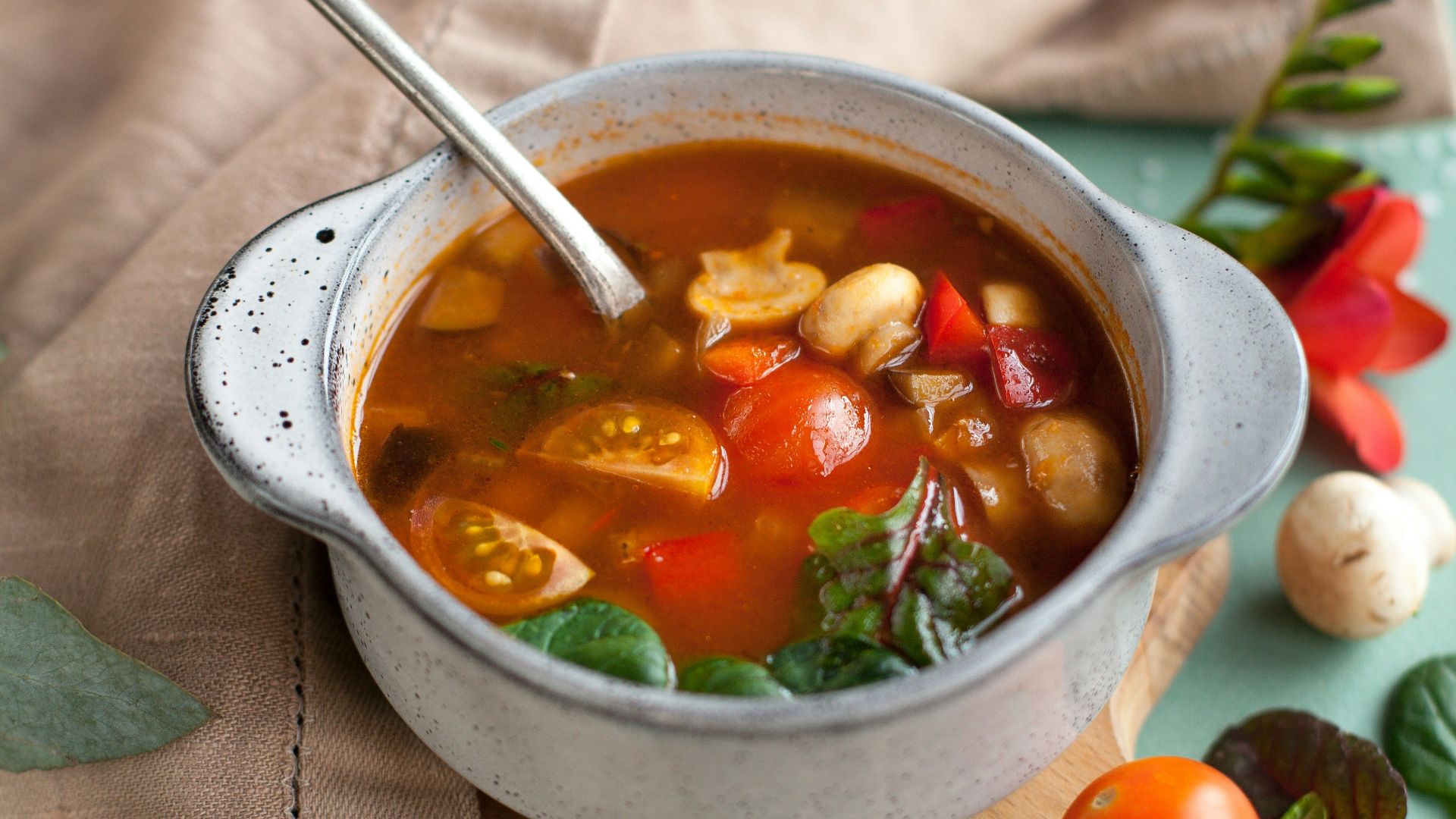stainless steel spoon on white ceramic bowl