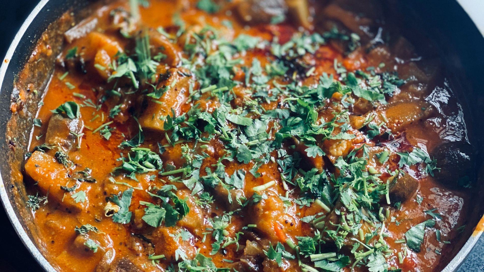 cooked food in black cooking pot