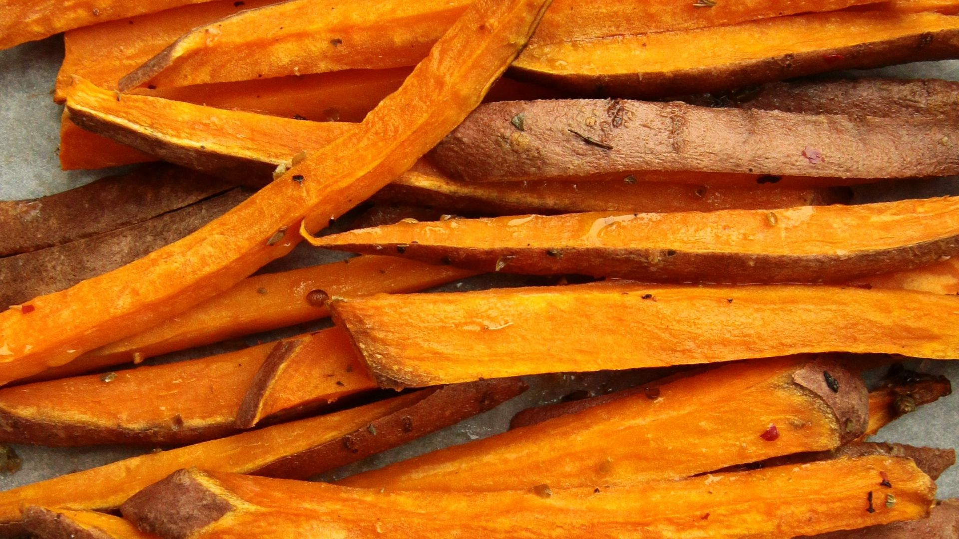 sliced carrots on gray surface