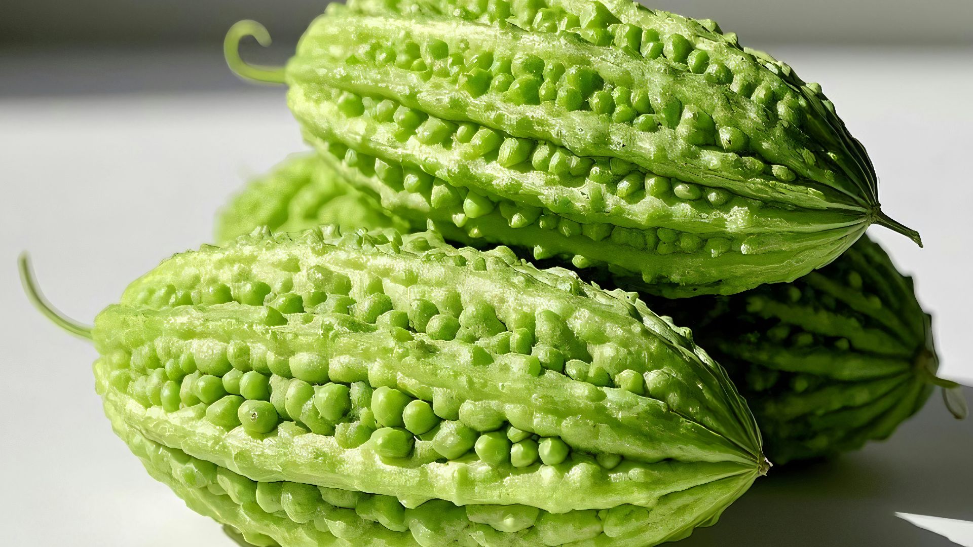 A couple of cucumbers sitting on top of a table