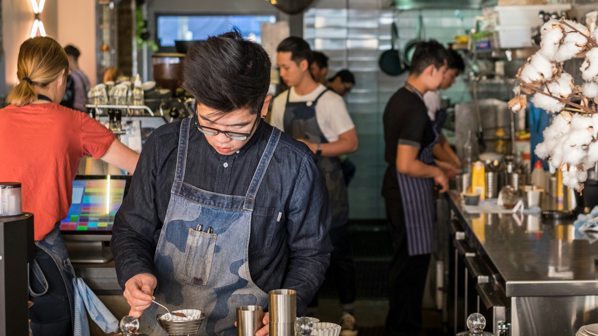 group of people in kitchen