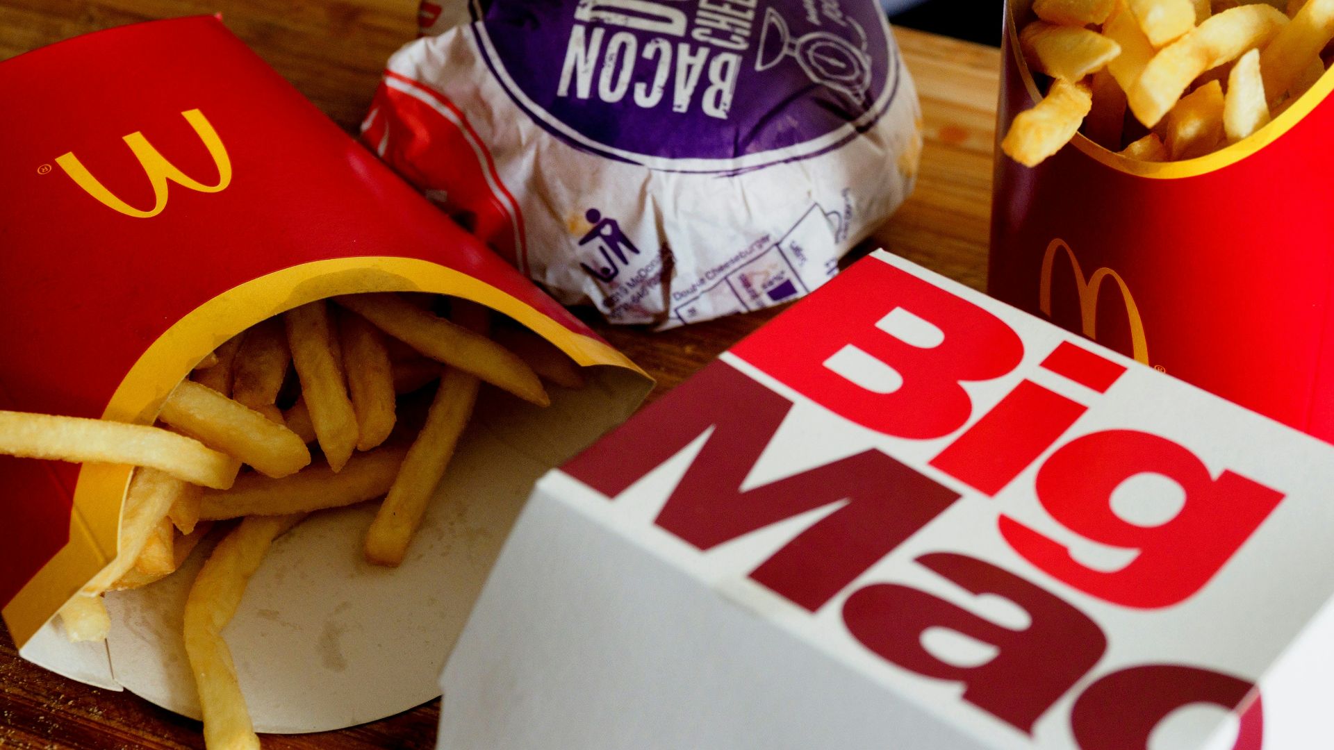 a sandwich sitting on top of a wooden table