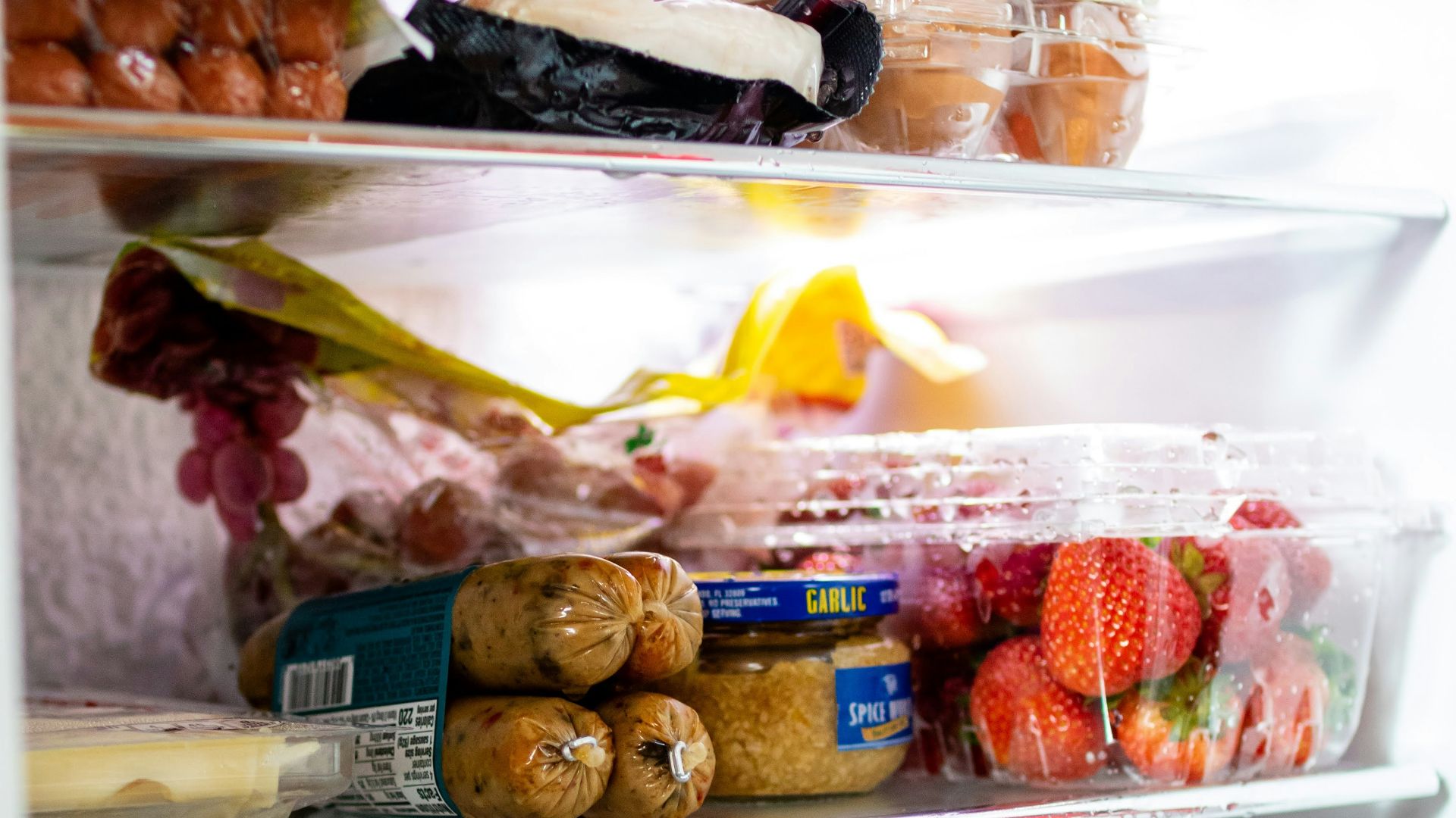 a refrigerator filled with lots of food and drinks