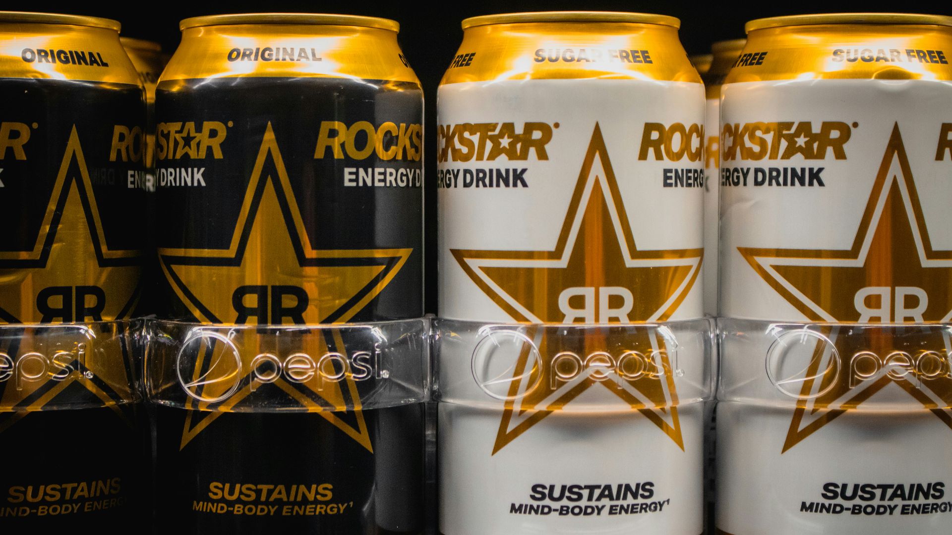Rockstar energy drink cans are on display.