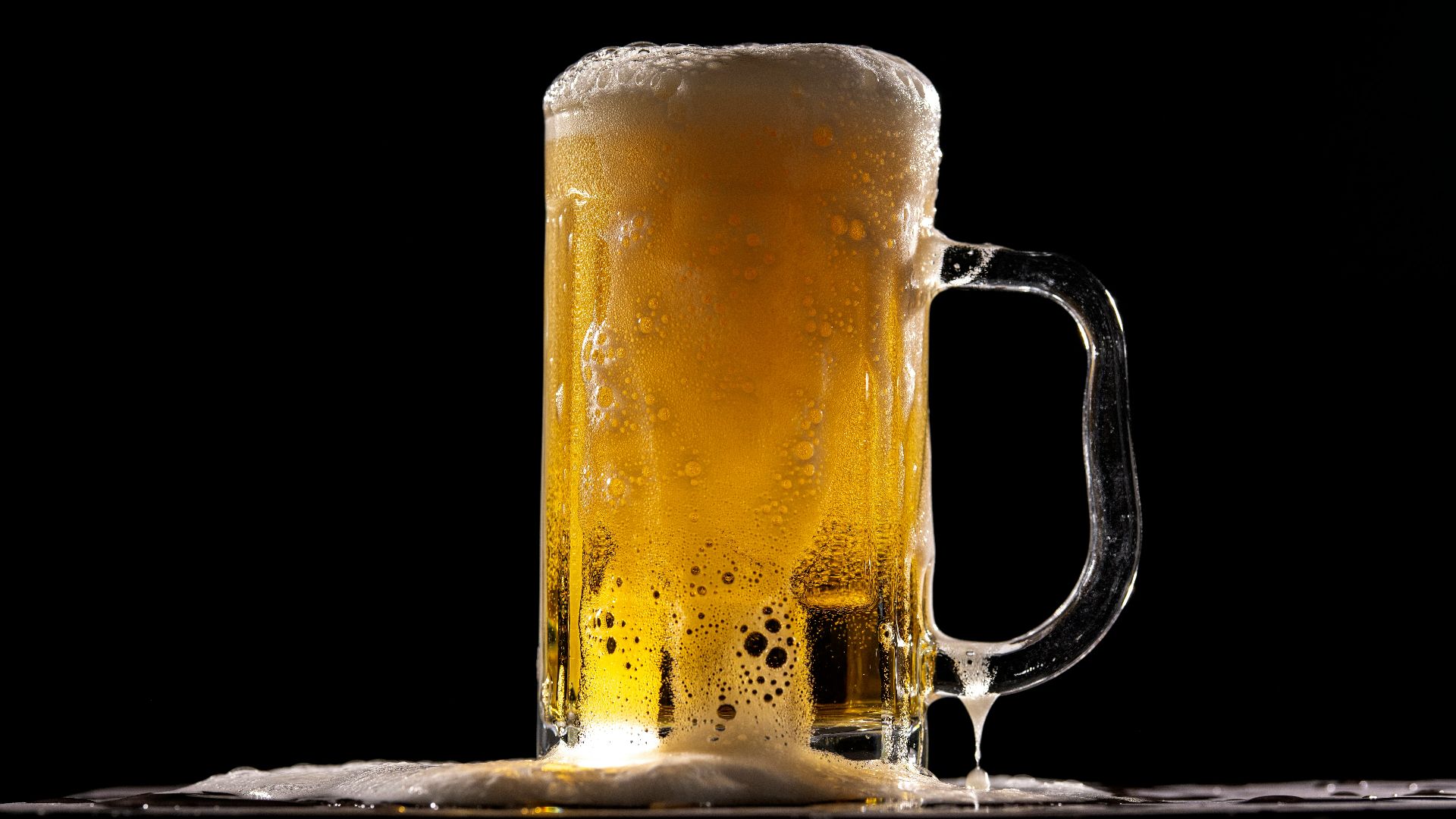 clear glass beer mug with beer