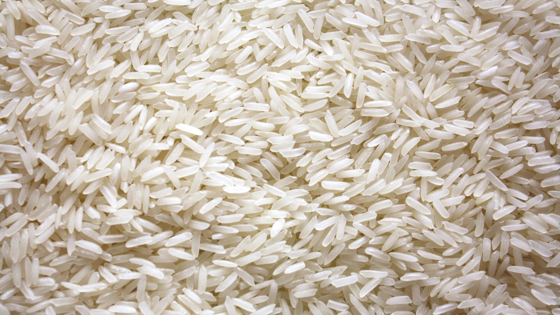 a pile of white rice sitting on top of a table