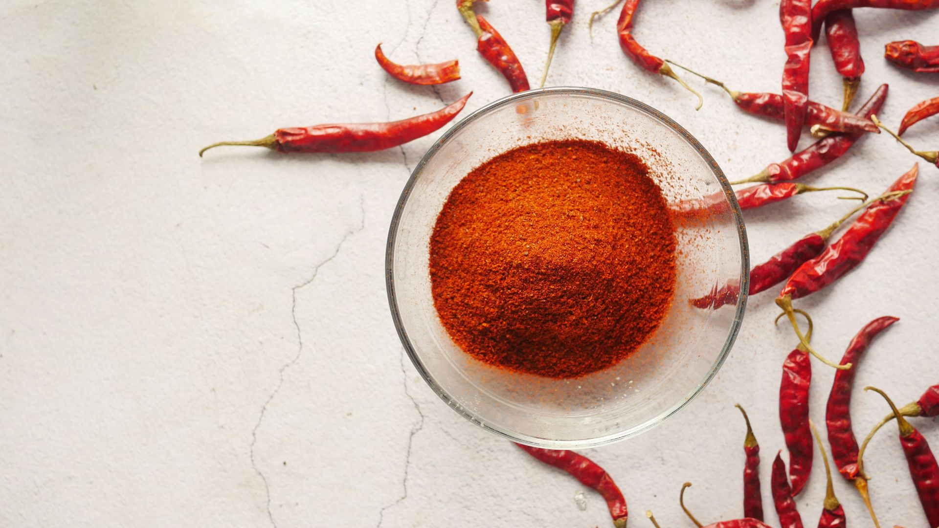 red chili on clear glass bowl
