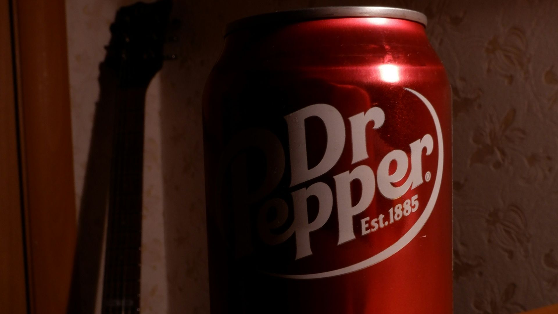 a can of dr pepper sitting on a table