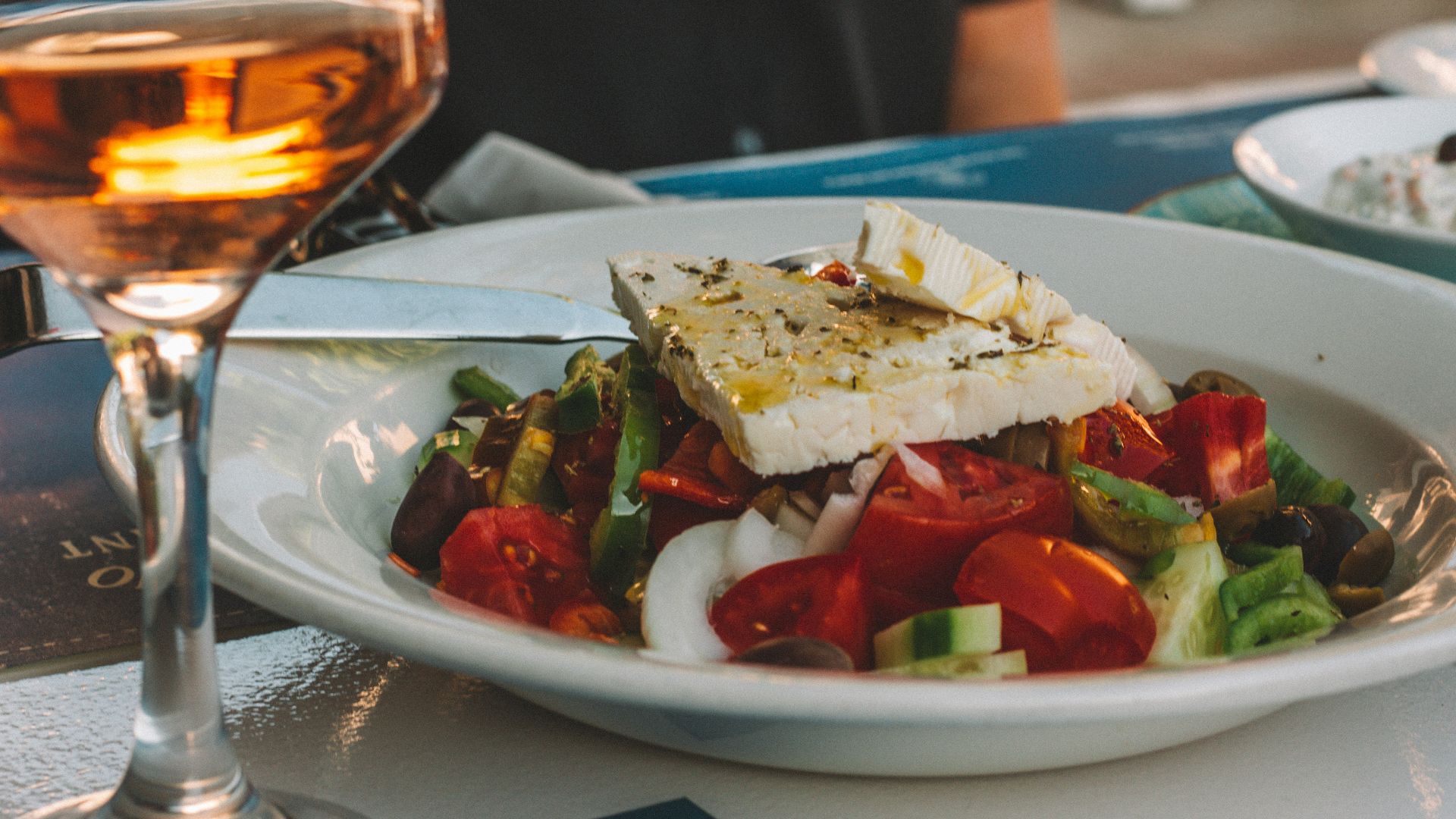 sliced tomato and cucumber on white ceramic plate