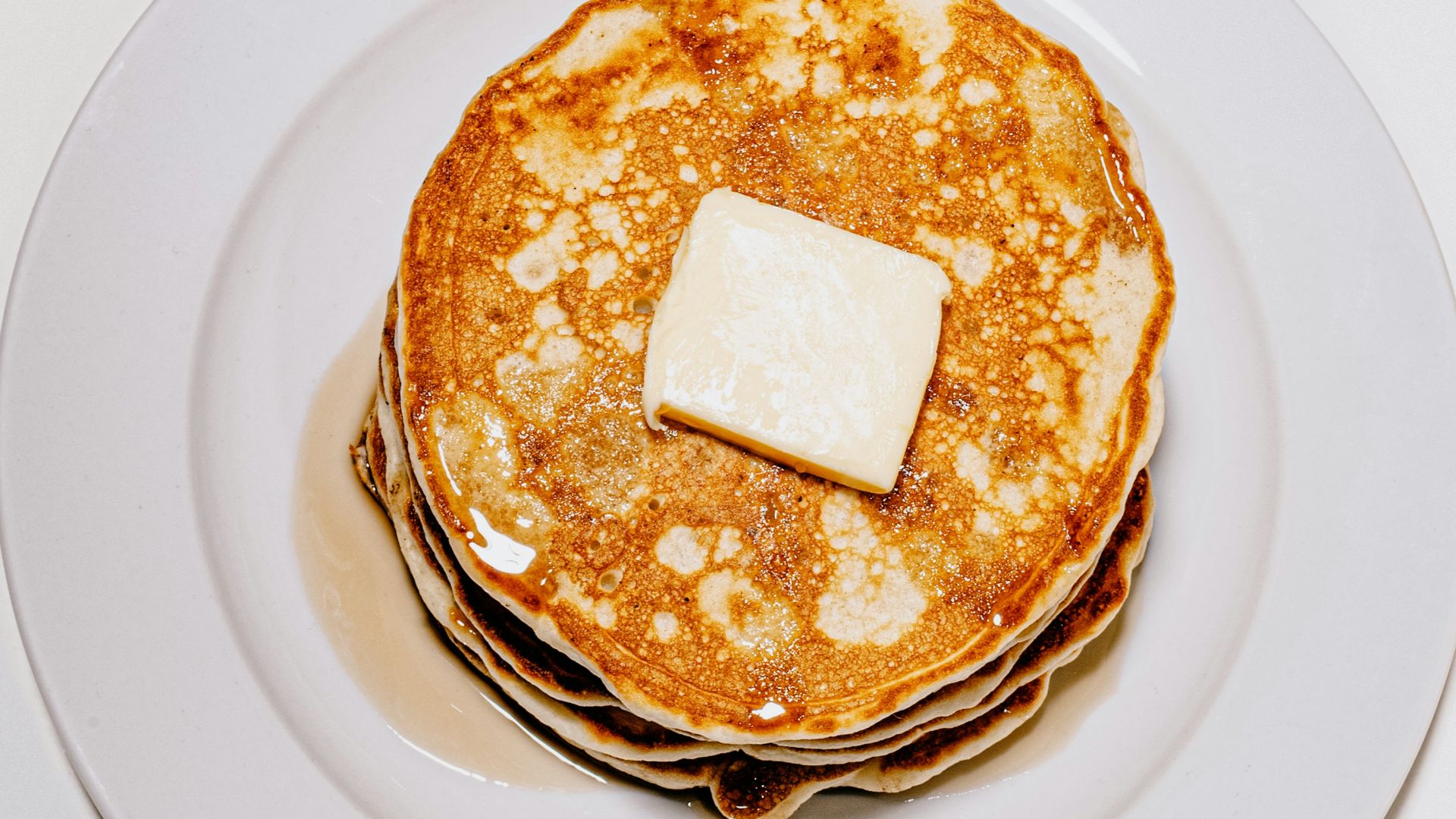 bread on white ceramic plate